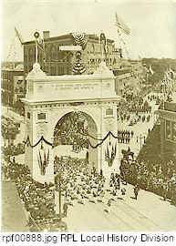 Marchers passing through the Otis Arch.