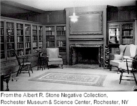 book lined room with a fireplace in the Chamber