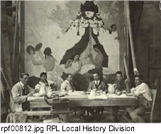 Artists eating lunch at Eastman Theatre mural site.