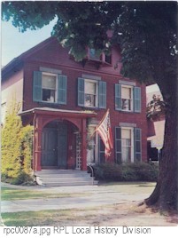 Susan B. Anthony house with flag.