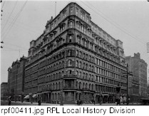 Powers Building at Four Corners, circa 1888-1891.